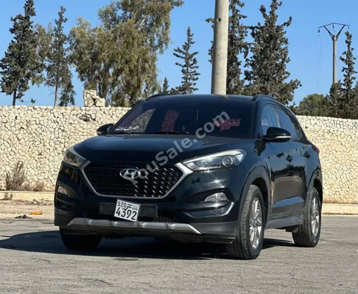 Hyundai  Tucson  2017  Automatic  169,000 km  4 Cylinder  FWD  SUV  Black  Gasoline