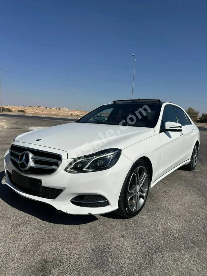 Mercedes-Benz  E-Class  250  2016  Automatic  289,000 km  4 Cylinder  4WD  Sedan  White  Diesel