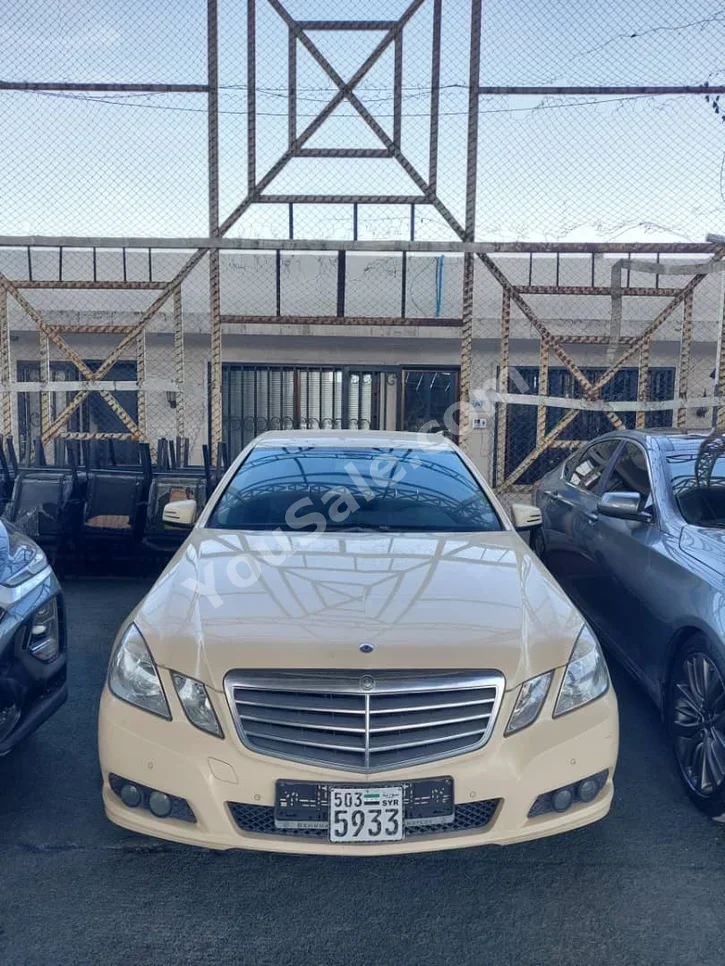 Mercedes-Benz  E-Class  200  2011  Automatic  90,000 km  4 Cylinder  RWD  Sedan  Beige  Diesel