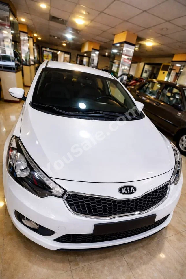Kia  K3  2013  Automatic  130,000 km  4 Cylinder  FWD  Sedan  White  Gasoline