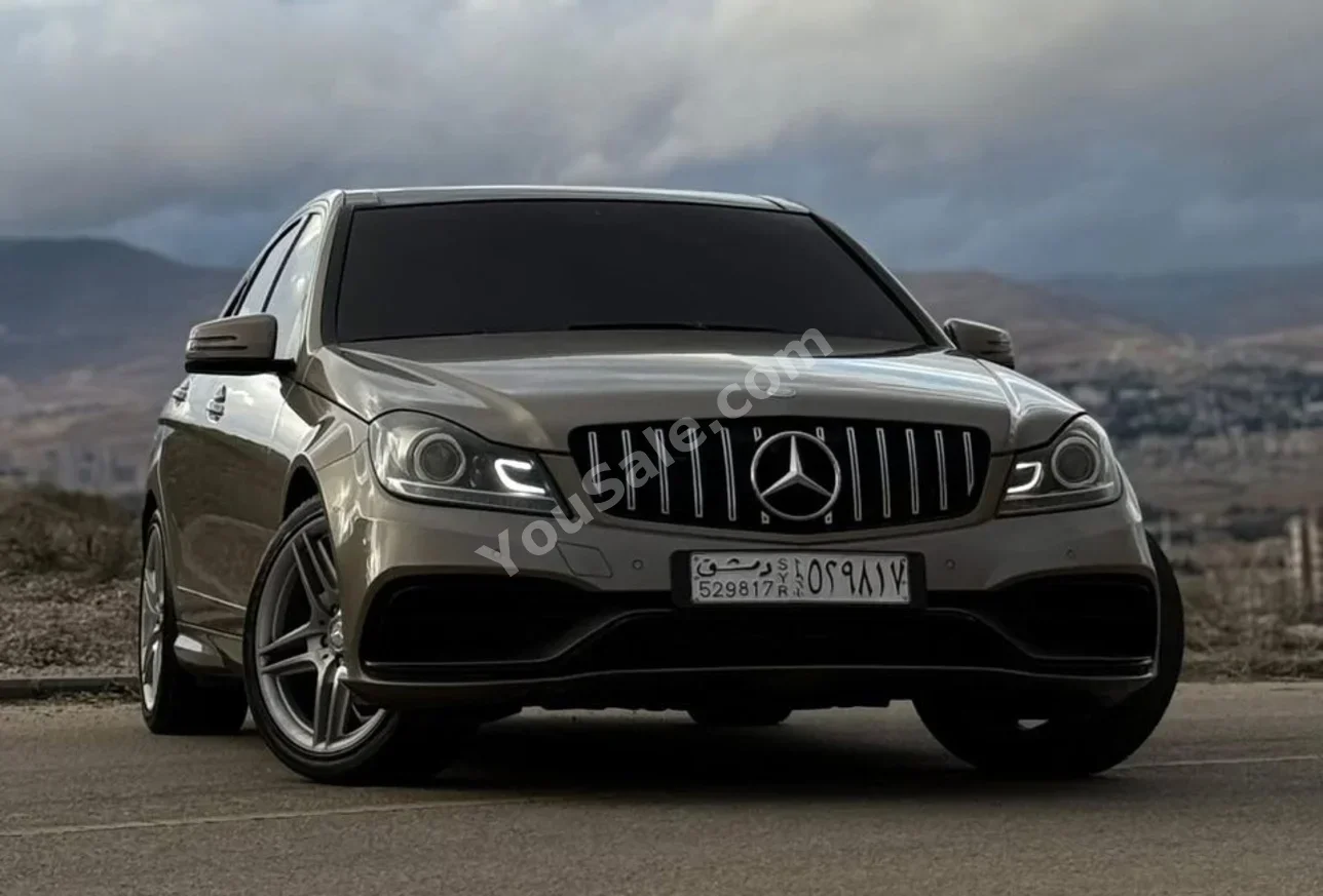 Mercedes-Benz  C-Class  180  2011  Automatic  73,000 km  4 Cylinder  RWD  Sedan  Brown  Gasoline