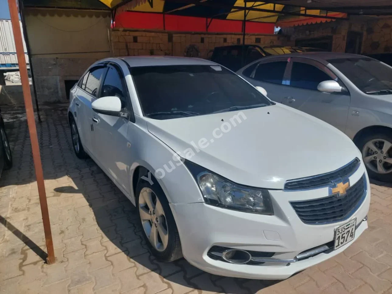 Chevrolet  Cruze  LTZ  2012  Automatic  177,000 km  4 Cylinder  FWD  Sedan  White  Gasoline