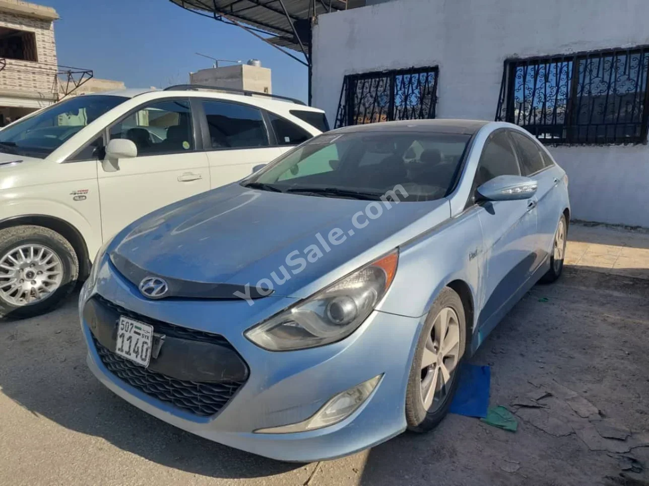 هيونداي سوناتا 2012 اتوماتيك 117,000 كم 4 سلندر دفع أمامي سيدان سمائي هايبرد