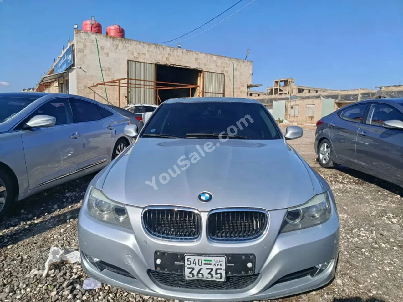 BMW  3-Series  320i  2010  Automatic  116,000 km  4 Cylinder  RWD  Sedan  Silver  Gasoline