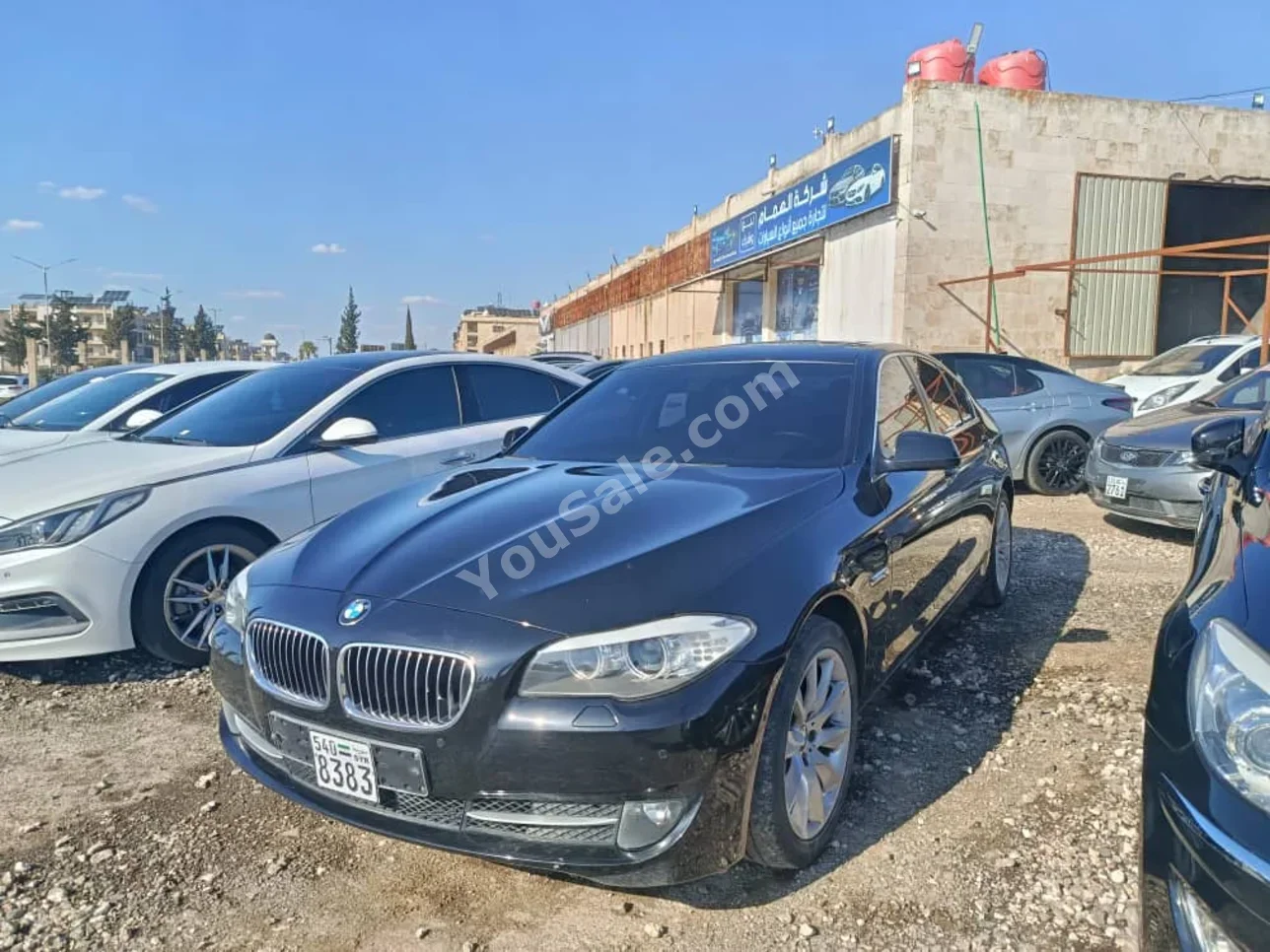 BMW  5-Series  528i  2012  Automatic  179,000 km  4 Cylinder  RWD  Sedan  Black  Gasoline