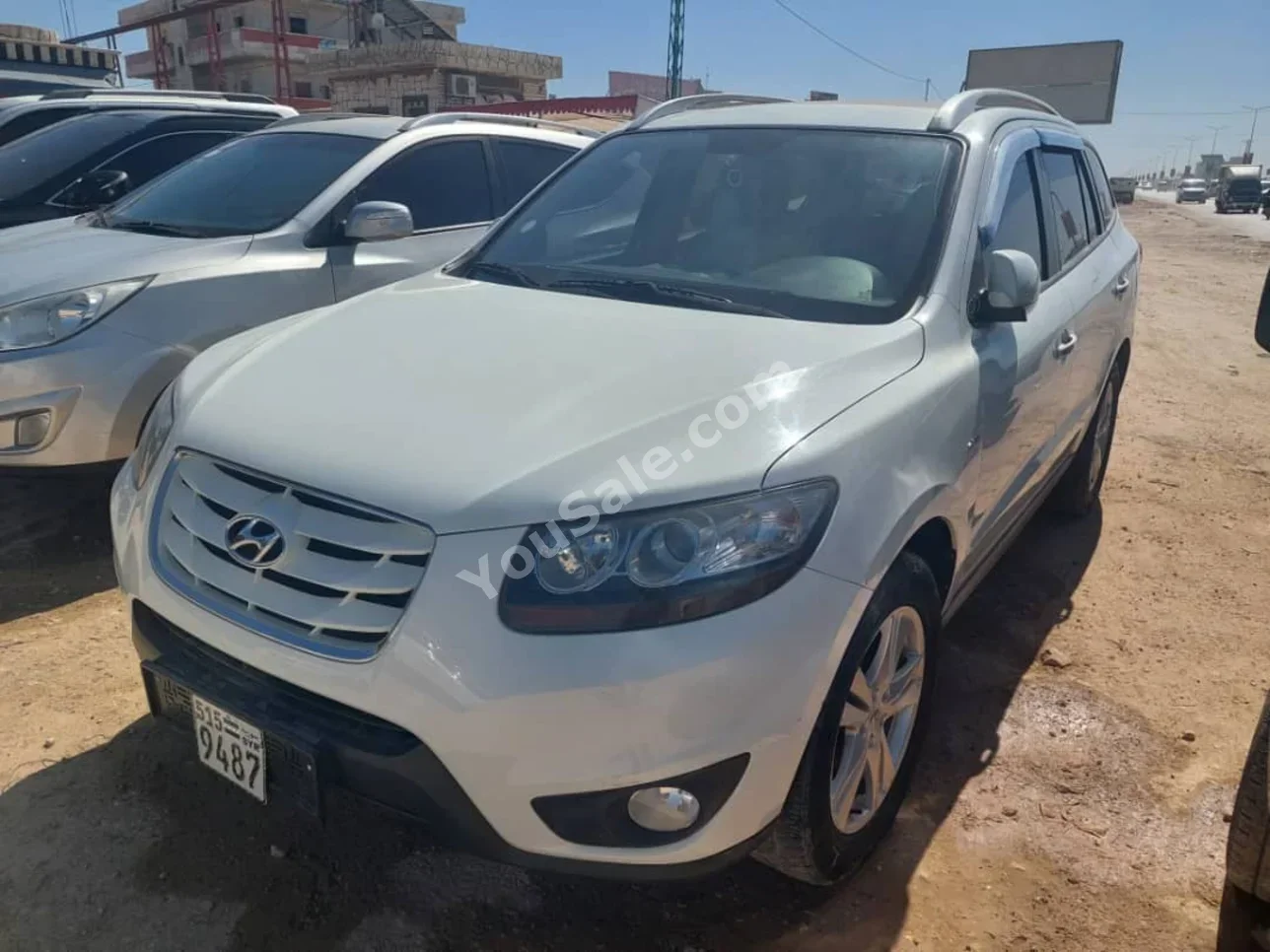 Hyundai  Santa Fe  2010  Automatic  174,000 km  4 Cylinder  FWD  SUV  White  Diesel