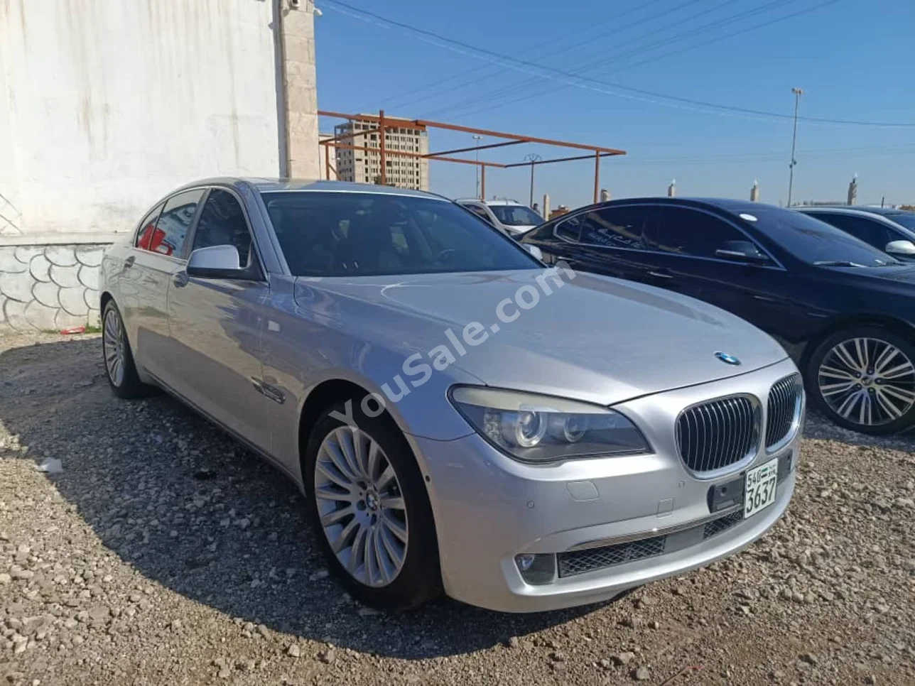 BMW  7-Series  740  2011  Automatic  157,000 km  6 Cylinder  RWD  Sedan  Silver  Gasoline