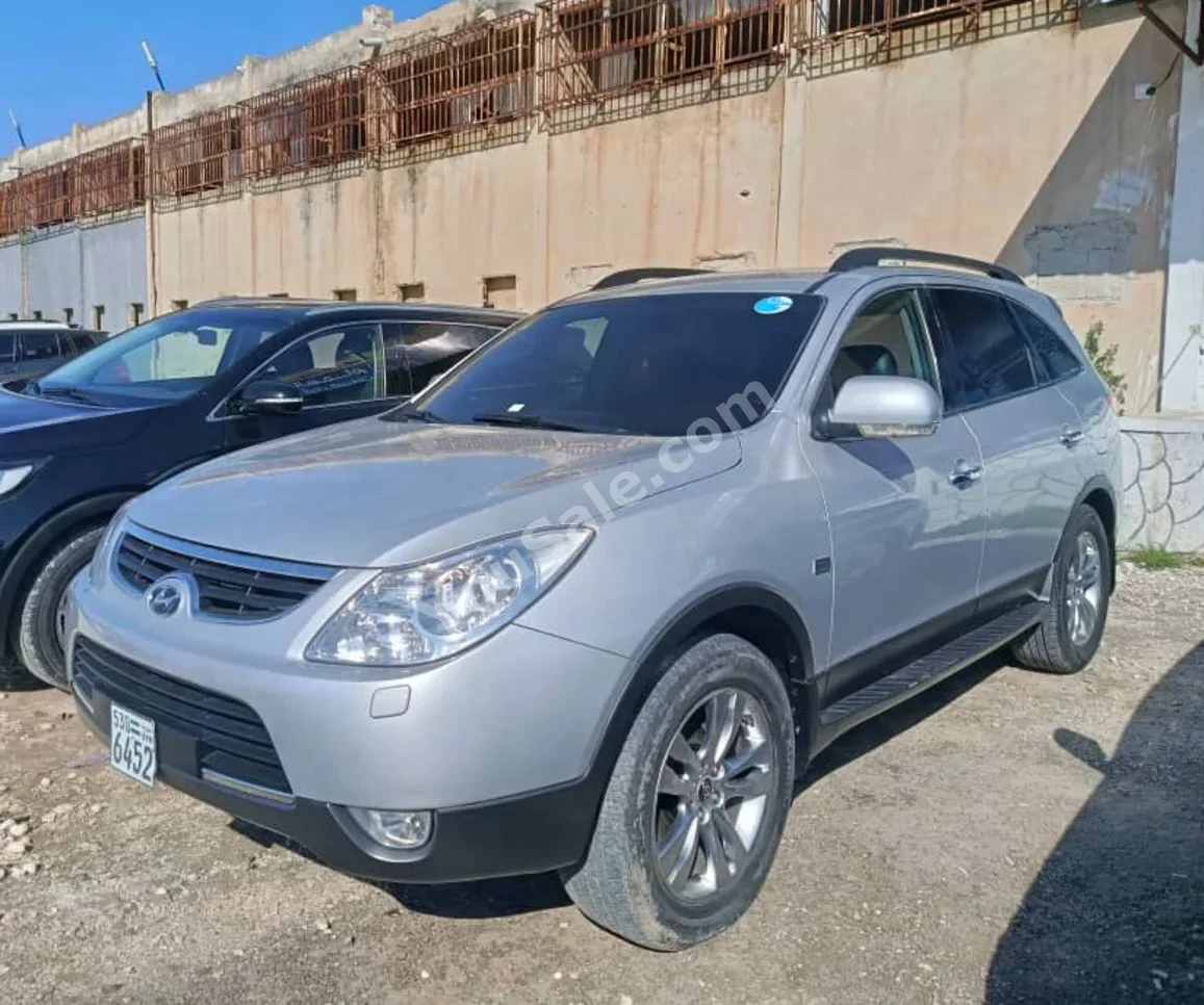 Hyundai  Veracruz  2012  Automatic  175,000 km  6 Cylinder  FWD  SUV  Silver  Diesel