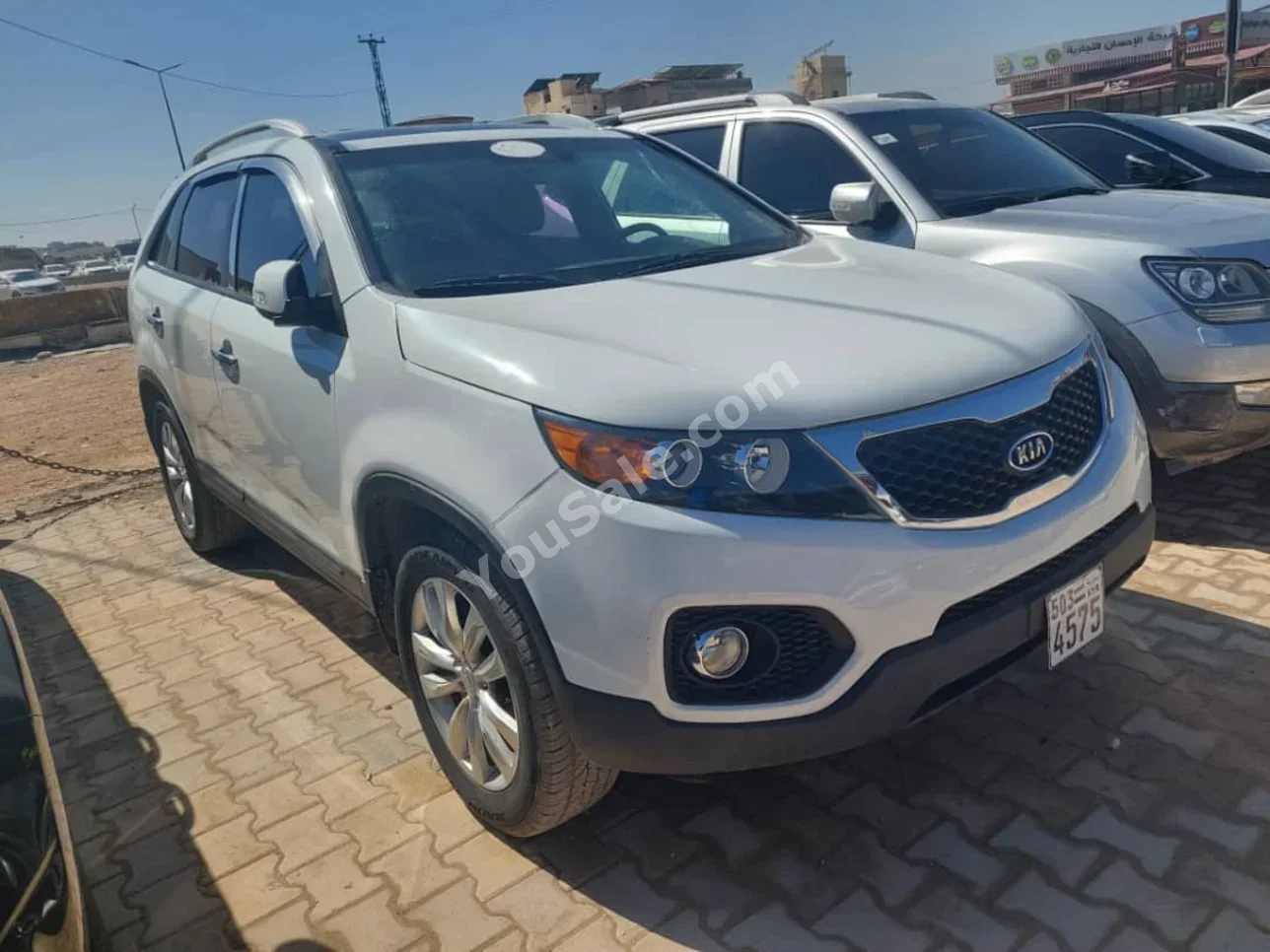 Kia  Sorento  2009  Automatic  119,000 km  4 Cylinder  RWD  SUV  White  Diesel