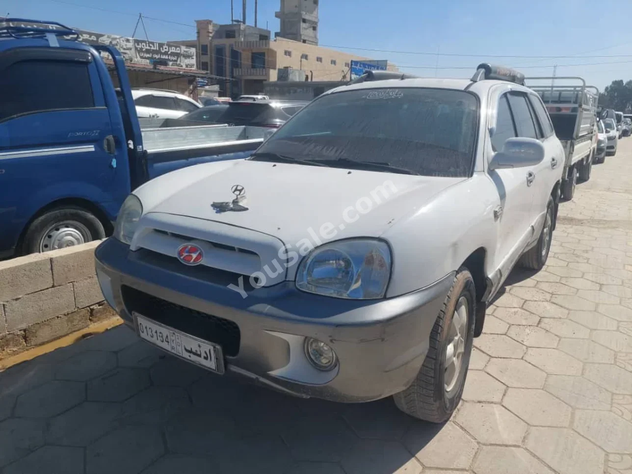 Hyundai Santa Fe 2005 Automatic 214,000 km 4 Cylinder FWD SUV White Diesel