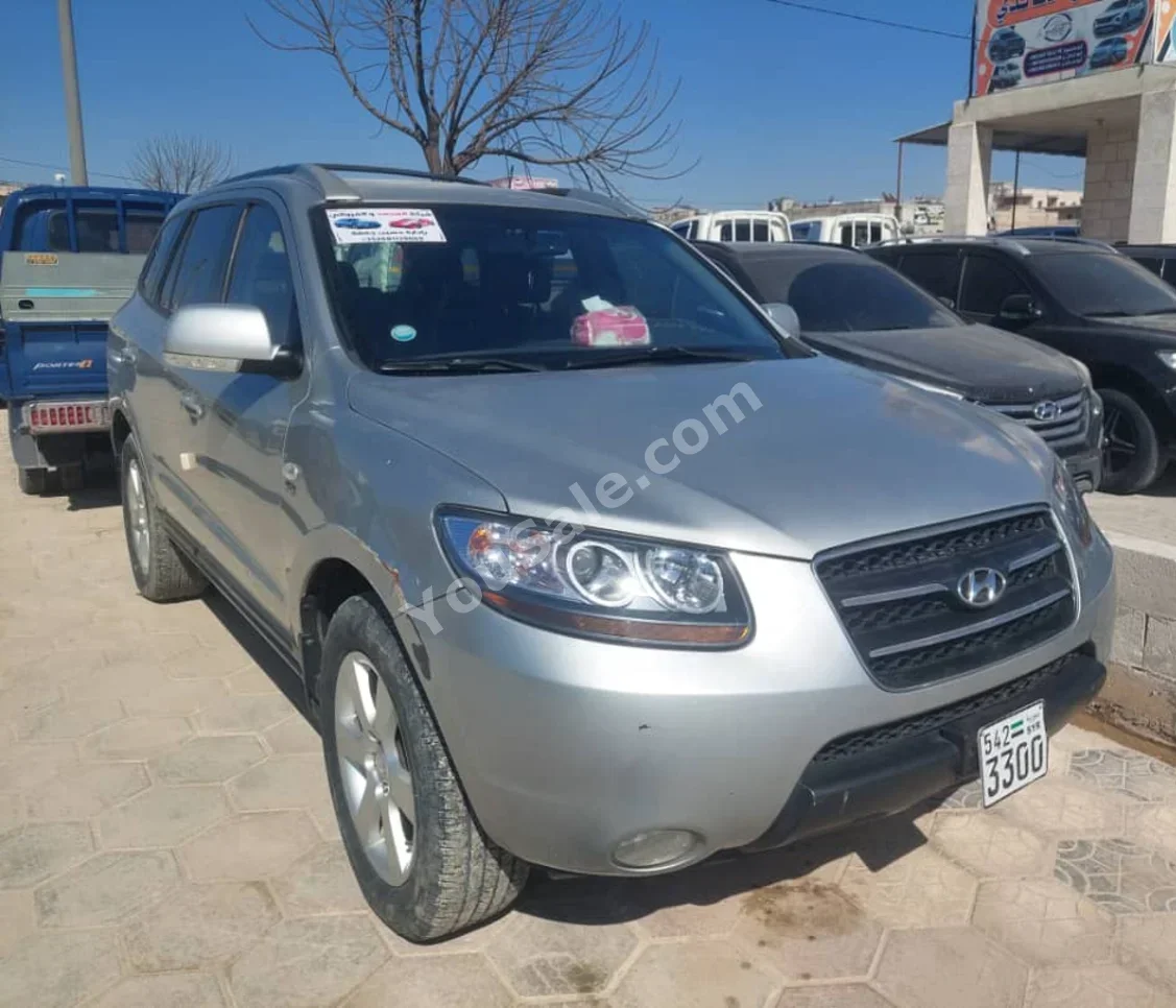 Hyundai  Santa Fe  2007  Automatic  125,000 km  4 Cylinder  FWD  SUV  Silver  Diesel