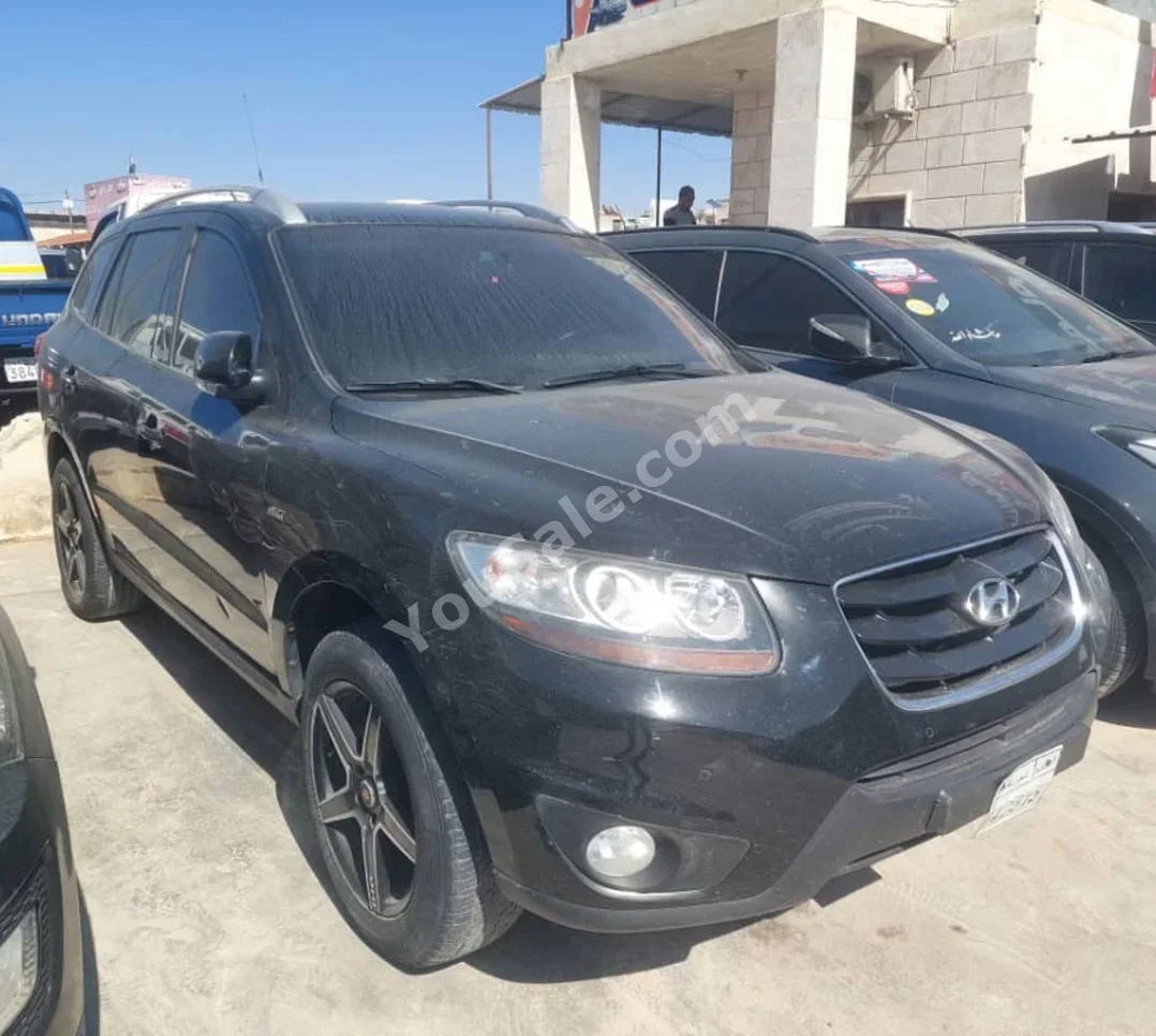 Hyundai  Santa Fe  2009  Automatic  184,000 km  4 Cylinder  FWD  SUV  Black  Diesel