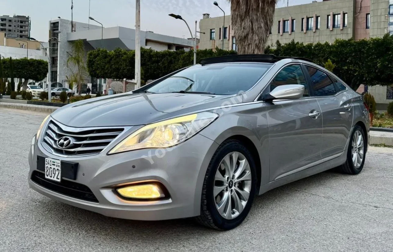 Hyundai  Azera  2012  Automatic  112,000 km  6 Cylinder  FWD  Sedan  Gray  Gasoline