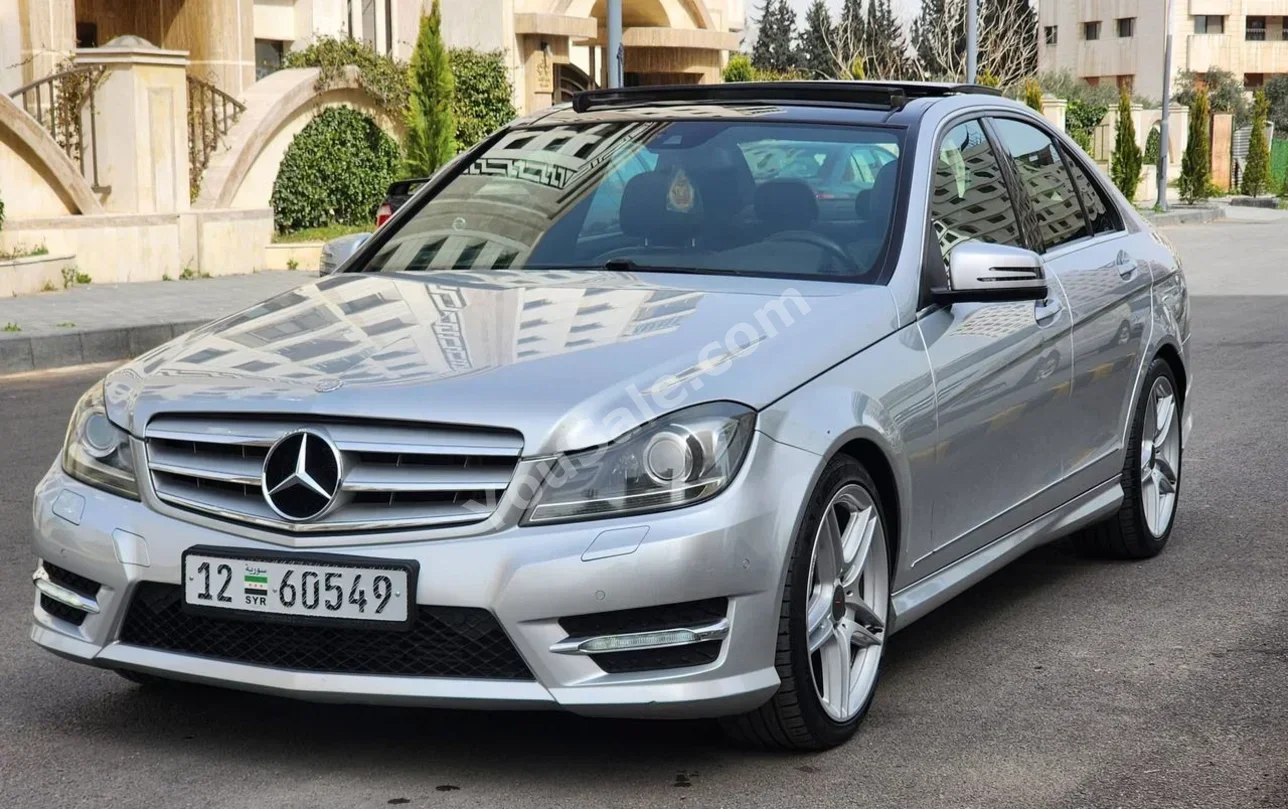Mercedes-Benz  C-Class  200  2013  Automatic  245,000 km  4 Cylinder  RWD  Sedan  Silver  Gasoline