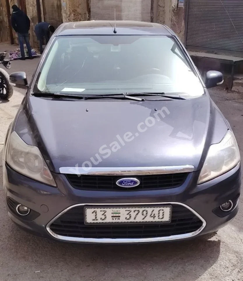 Ford  Focus  2008  Automatic  189,000 km  4 Cylinder  FWD  Sedan  Dark Blue  Gasoline