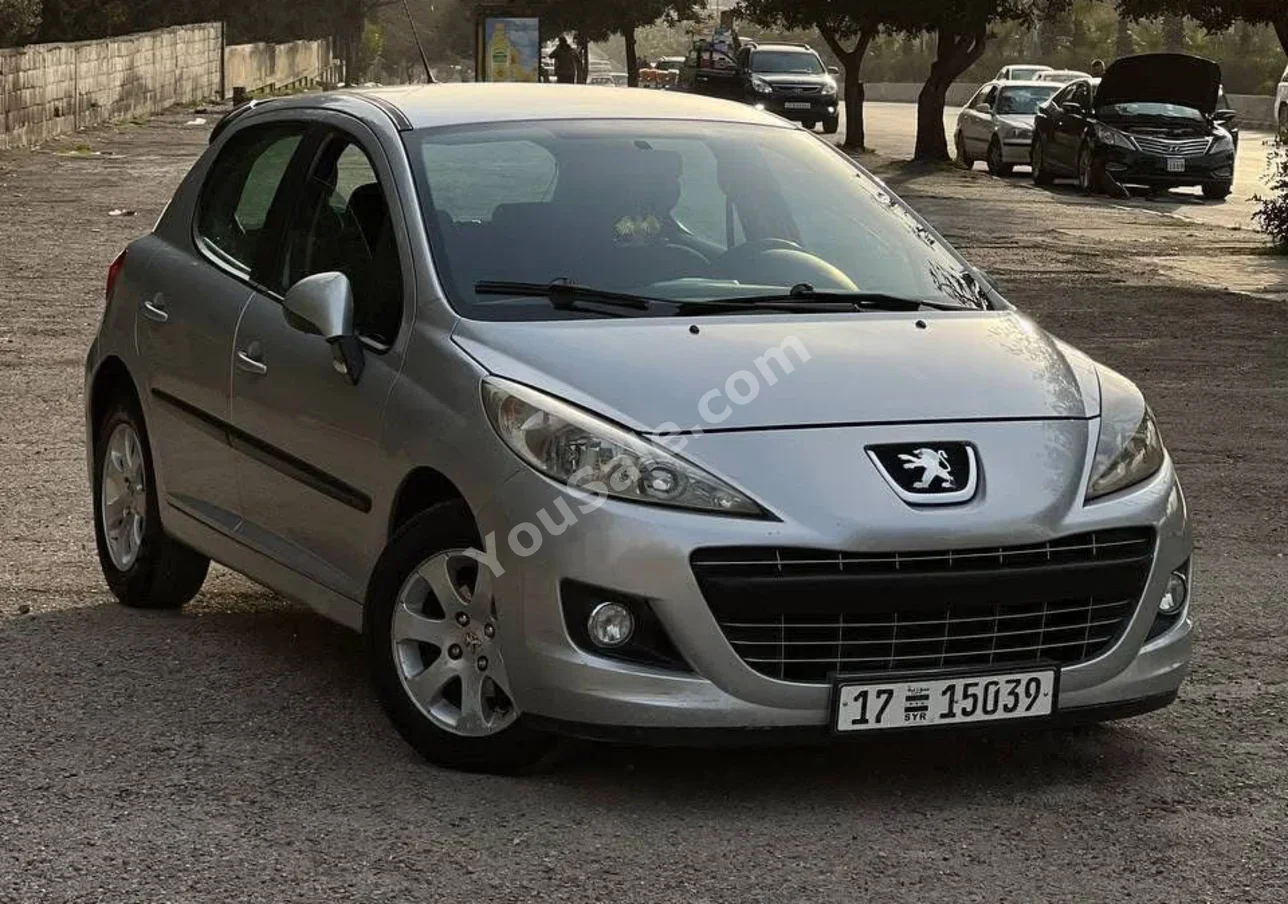 Peugeot 207 2010 Automatic 200,000 km 4 Cylinder FWD Hatchback Silver Gasoline
