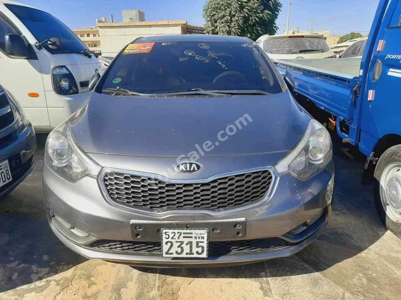 Kia  K3  2013  Automatic  227,000 km  4 Cylinder  FWD  Sedan  Gray  Gasoline