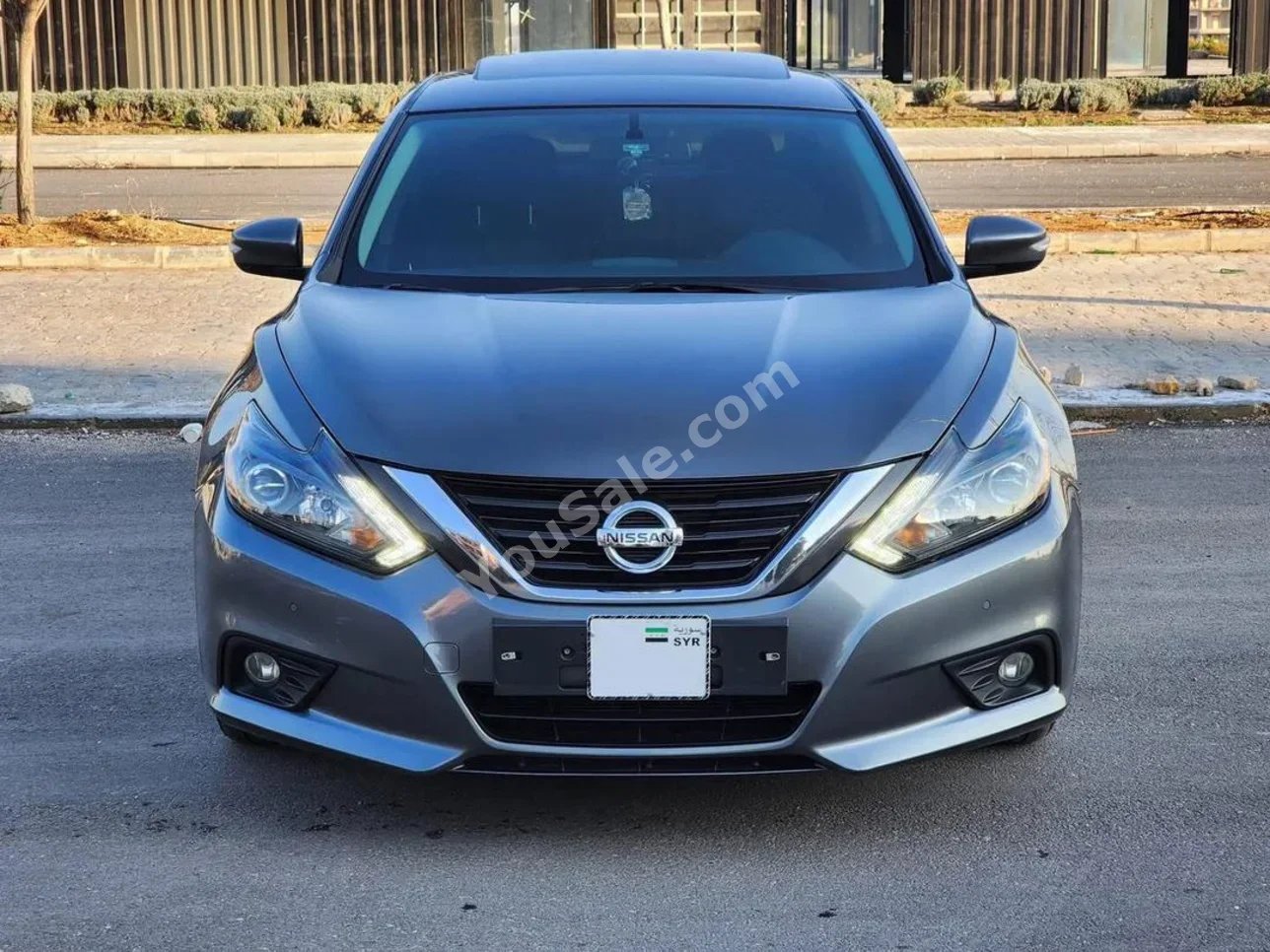 Nissan  Altima  2017  Automatic  93,000 km  4 Cylinder  FWD  Sedan  Gray  Gasoline