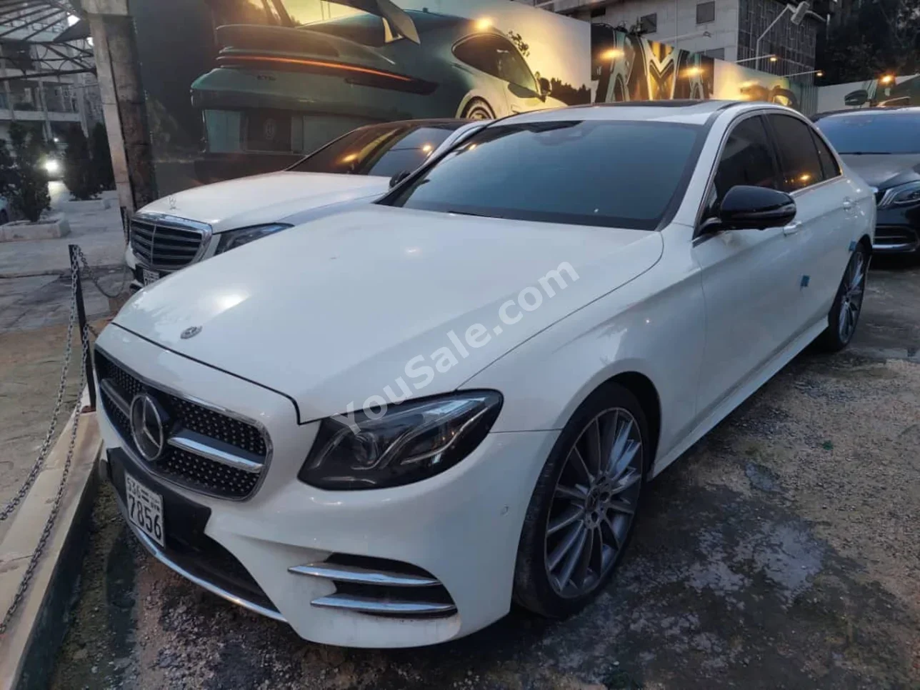 Mercedes-Benz  E-Class  300  2018  Automatic  93,000 km  4 Cylinder  4WD  Sedan  White  Gasoline