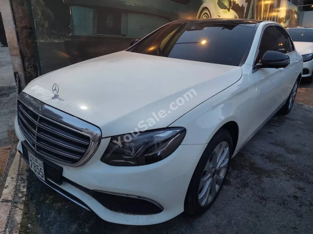Mercedes-Benz  E-Class  300  2019  Automatic  69,000 km  4 Cylinder  RWD  Sedan  White  Gasoline