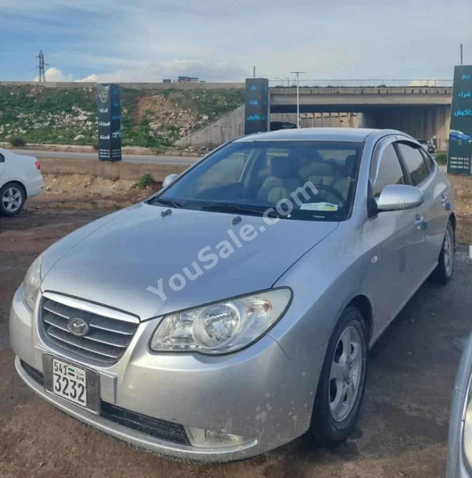 Hyundai  Avante  2007  Automatic  186,000 km  4 Cylinder  FWD  Sedan  Silver  Gasoline