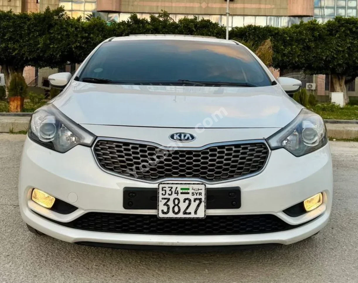 Kia  K3  2013  Automatic  189,000 km  4 Cylinder  FWD  Sedan  White  Gasoline