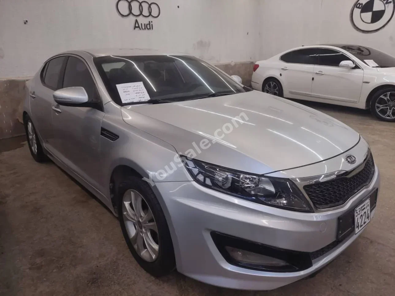 Kia  K5  2012  Automatic  135,000 km  4 Cylinder  FWD  Sedan  Silver  Gasoline