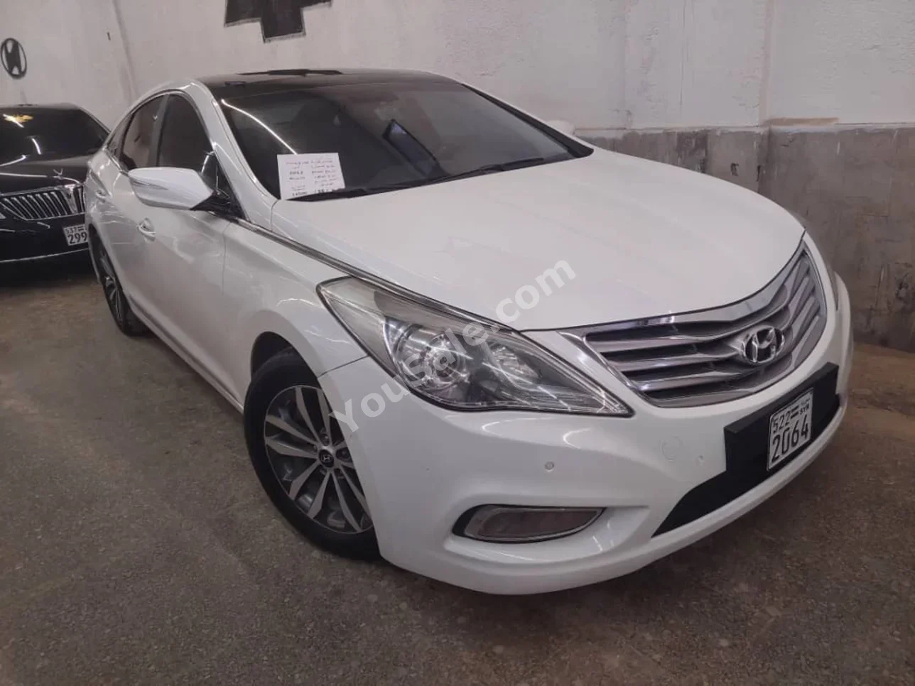 Hyundai  Grandeur  2012  Automatic  138,000 km  4 Cylinder  FWD  Sedan  White  Gasoline