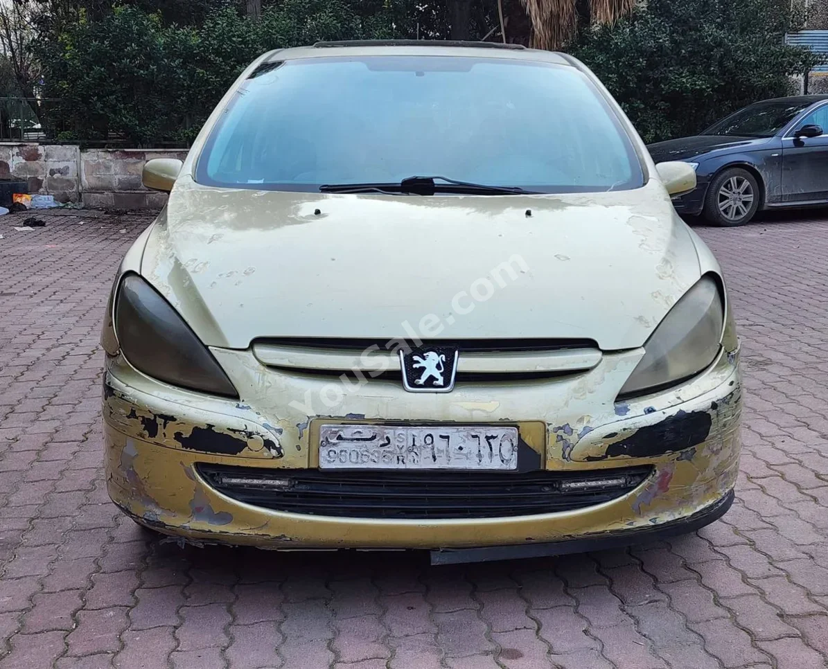 بيجو 307 2003 اتوماتيك 370,000 كم 4 سلندر دفع أمامي هاتشباك أصفر بنزين