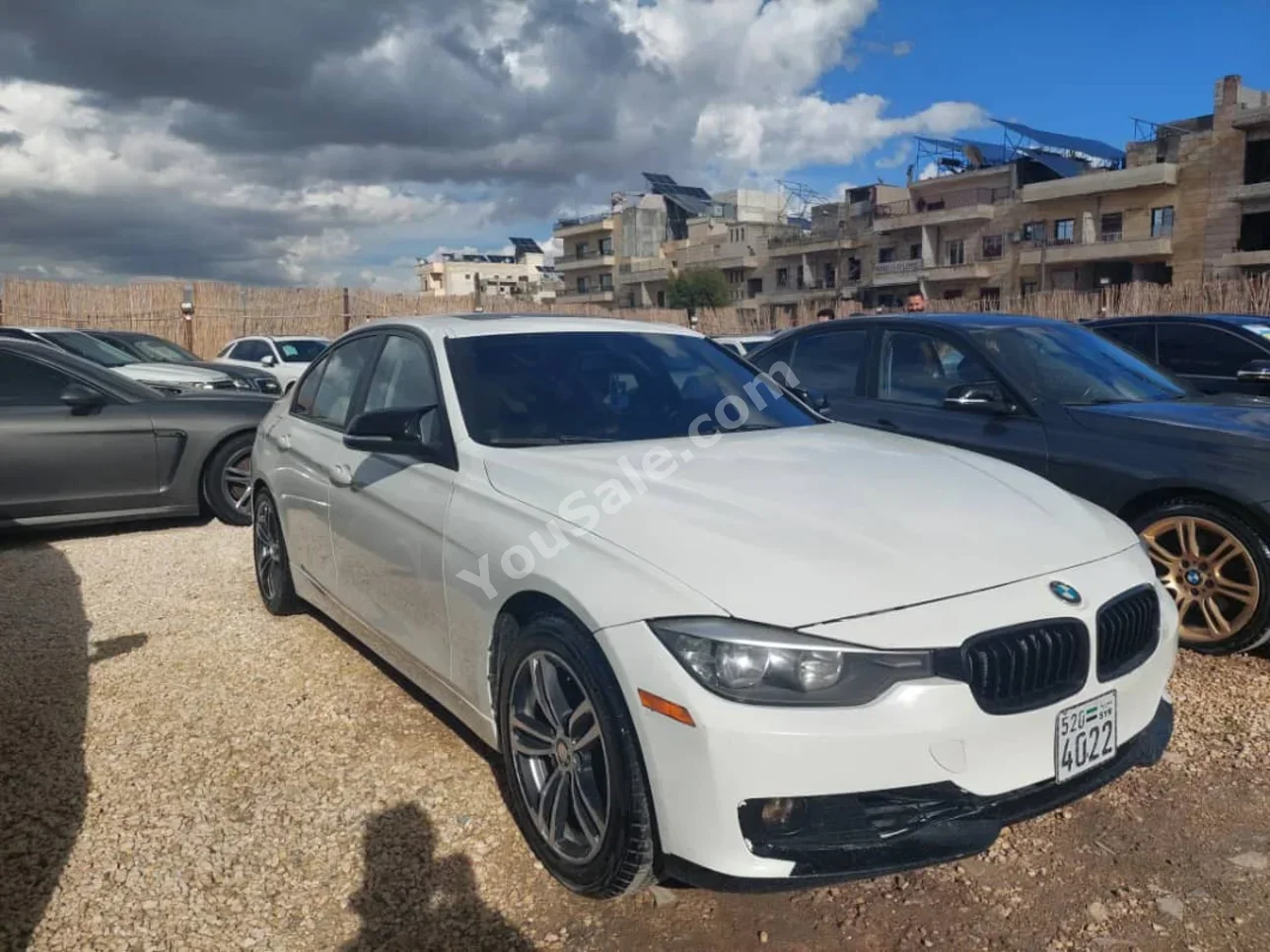 بي ام دبليو الفئة - الثالثة 328i 2013 اتوماتيك 145,000 كم 6 سلندر دفع خلفي سيدان أبيض بنزين