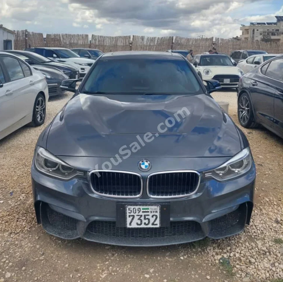 BMW  3-Series  320i  2017  Automatic  196,000 km  4 Cylinder  RWD  Sedan  Dark Gray  Gasoline