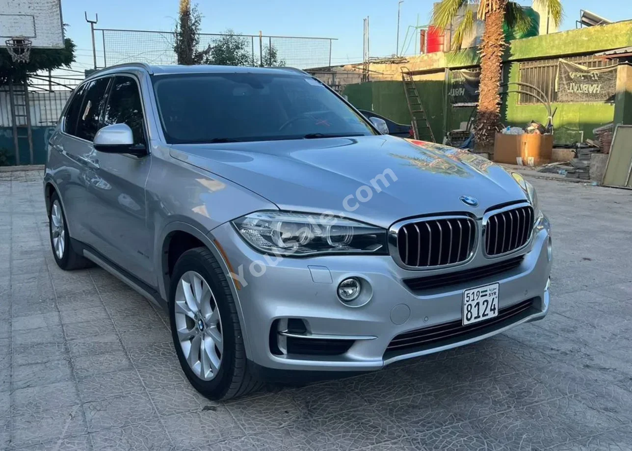 BMW  X-Series  5  2014  Automatic  142,000 km  4 Cylinder  AWD  SUV  Silver  Gasoline