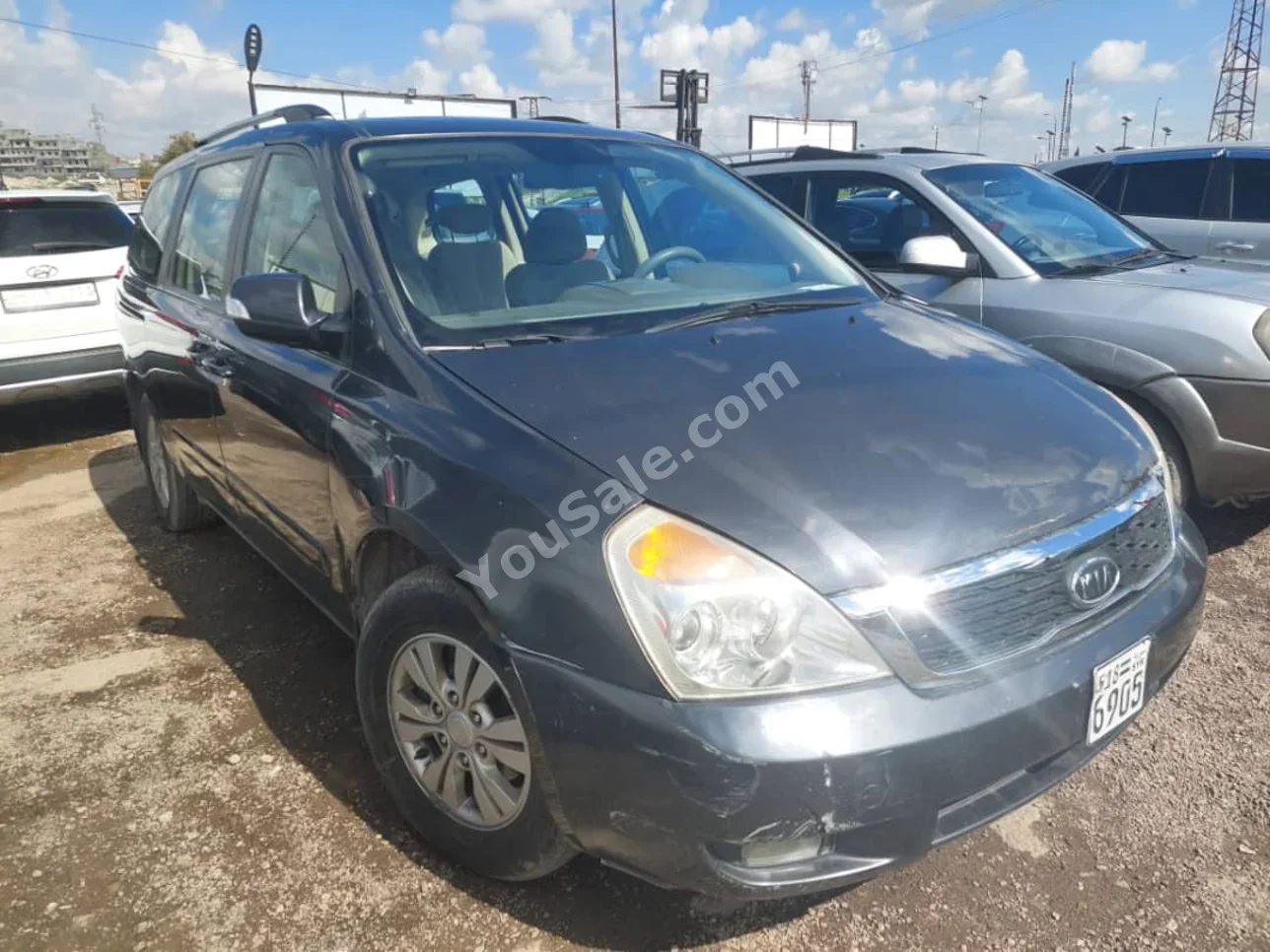 Kia  Carnival  2012  Automatic  175,000 km  4 Cylinder  RWD  Van / Bus  Black  Gasoline