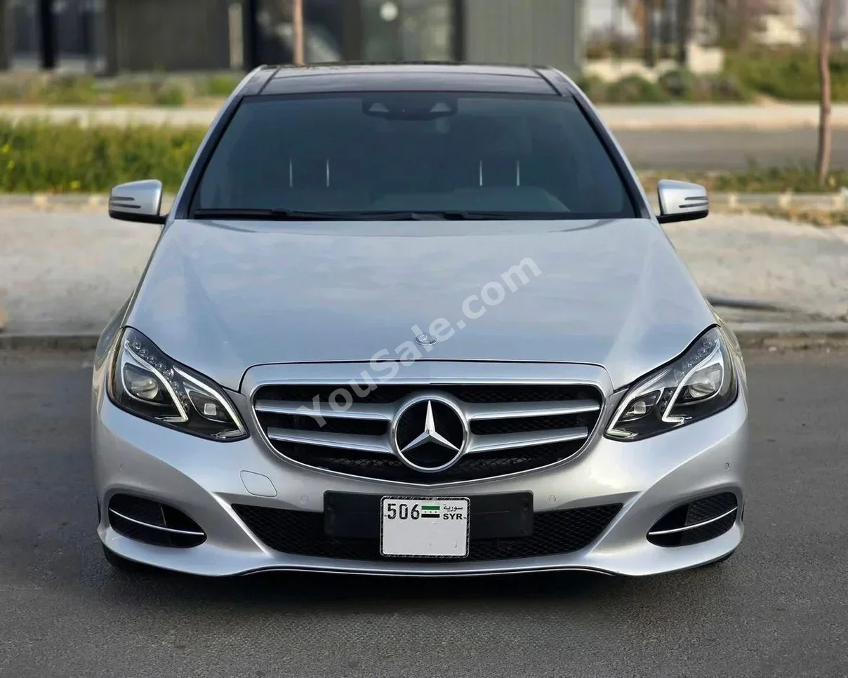 Mercedes-Benz  E-Class  300  2015  Automatic  170,000 km  6 Cylinder  RWD  Sedan  Silver  Gasoline