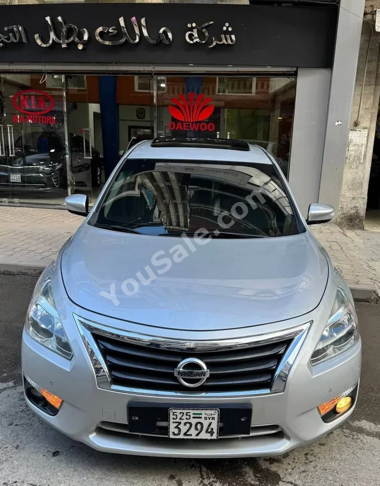 Nissan Altima 2015 Automatic 224,000 km 4 Cylinder FWD Sedan Silver Gasoline