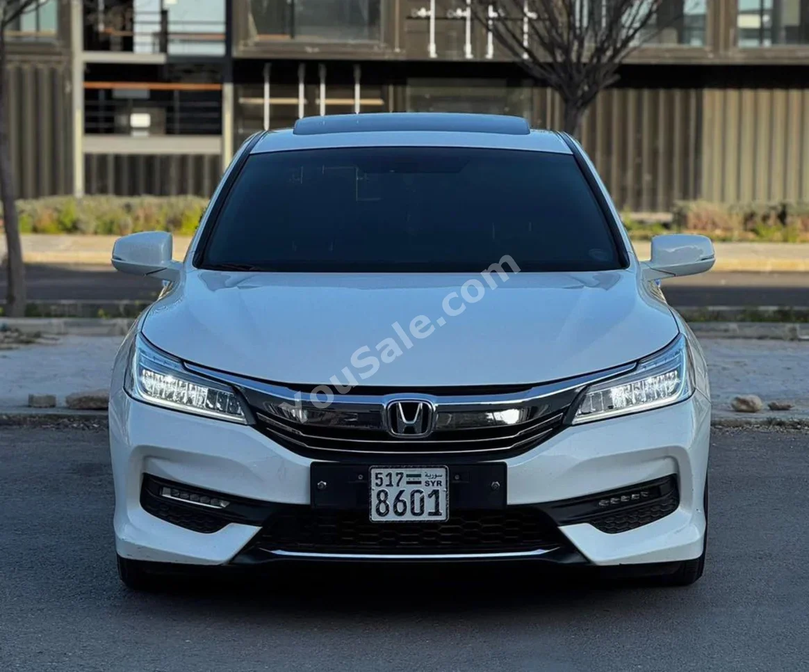 Honda  Accord  2017  Automatic  155,000 km  4 Cylinder  FWD  Sedan  White  Gasoline