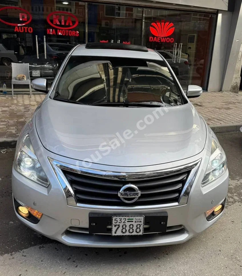 Nissan  Altima  2.5 S  2014  Automatic  225,000 km  4 Cylinder  FWD  Sedan  Silver  Gasoline