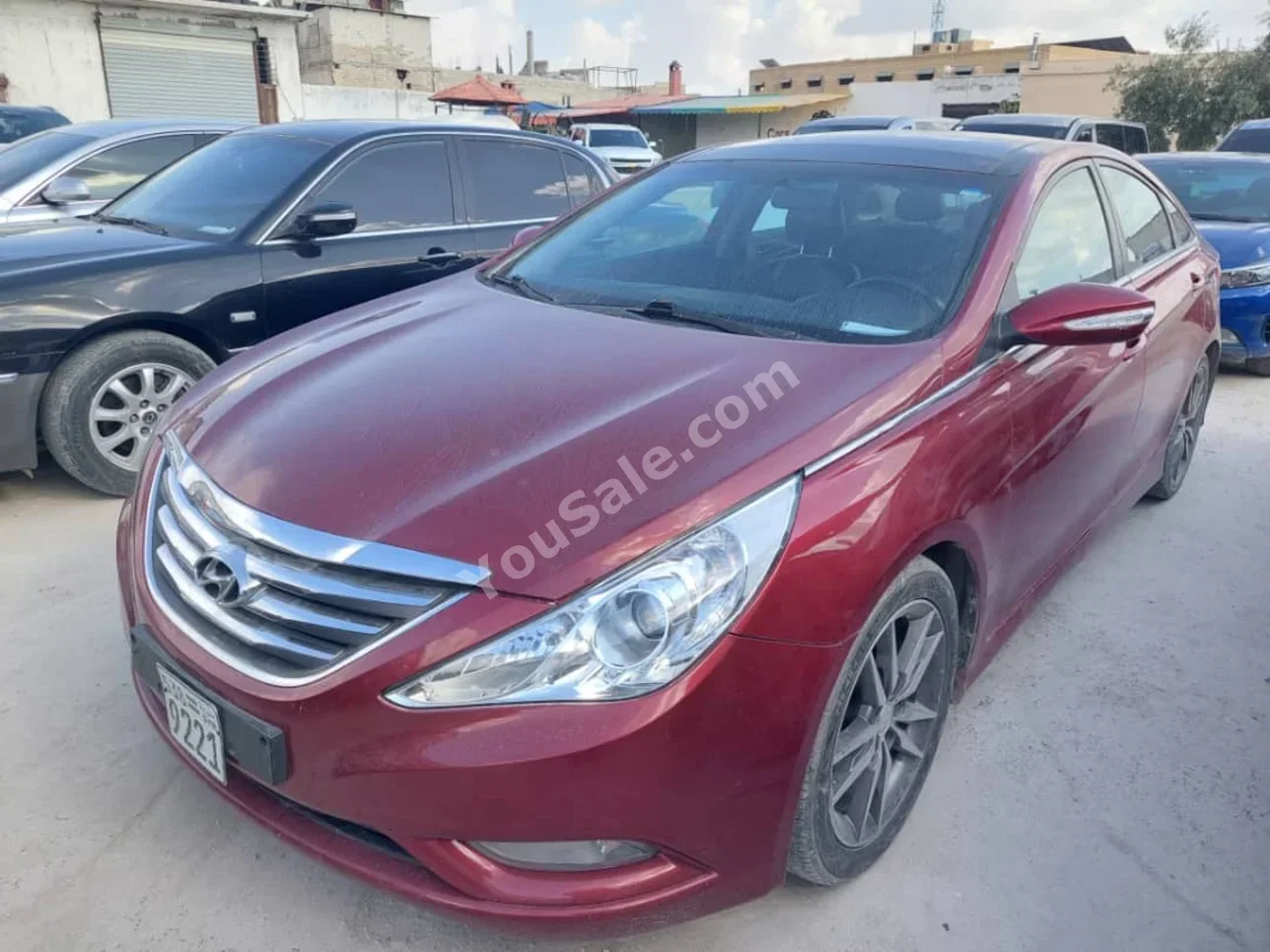 Hyundai  Sonata  2015  Automatic  225,000 km  4 Cylinder  FWD  Sedan  Red  Gasoline