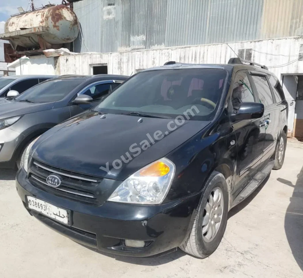 Kia Carnival 2009 Automatic 284,000 km 4 Cylinder RWD Van / Bus Black Diesel