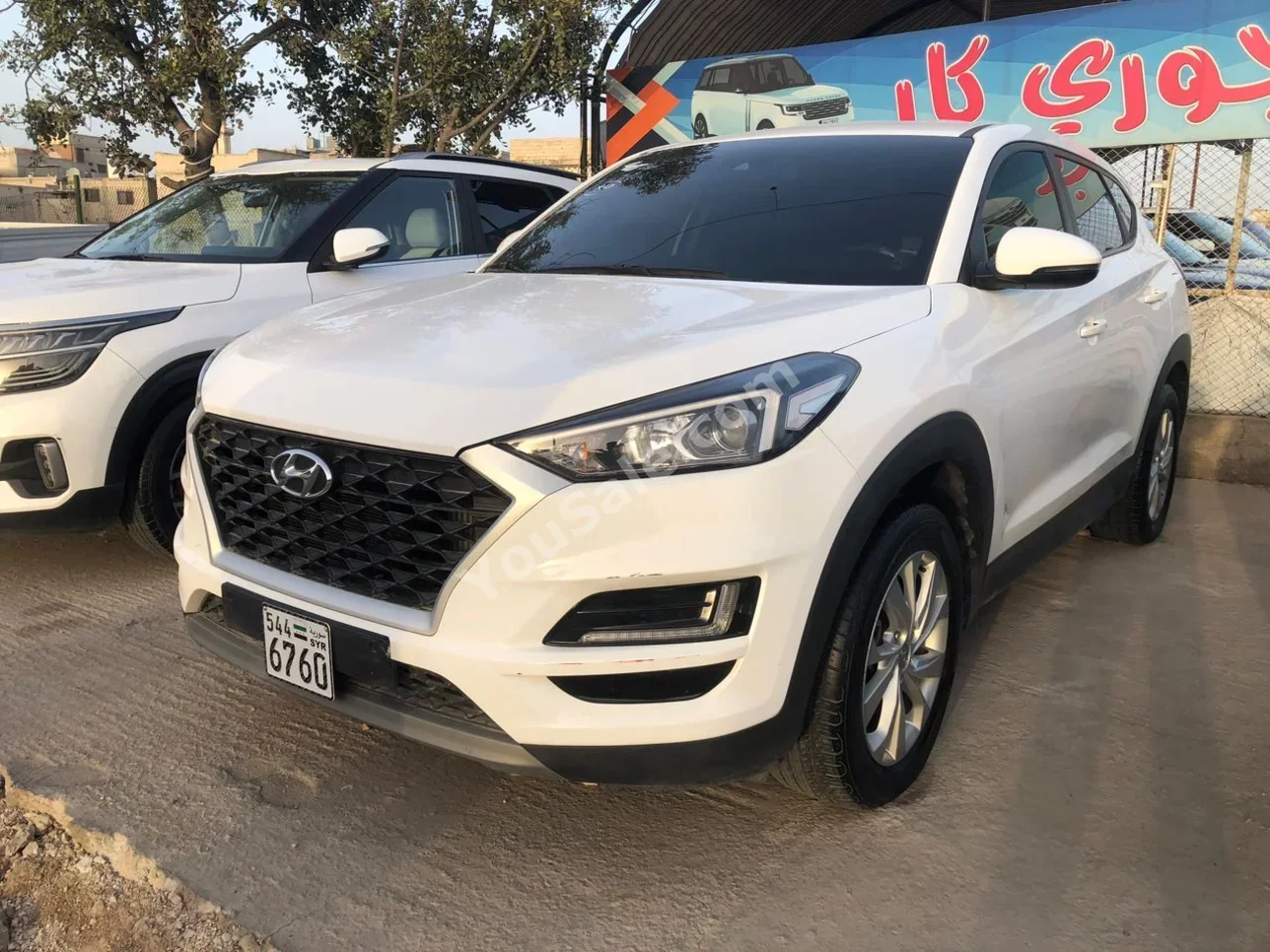 Hyundai Tucson 2019 Automatic 98,000 km 4 Cylinder AWD SUV White Gasoline