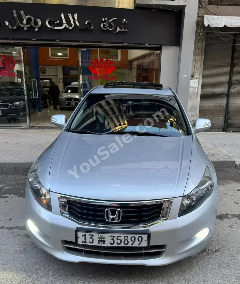 Honda  Accord  2009  Automatic  116,000 km  4 Cylinder  RWD  Sedan  Silver  Gasoline