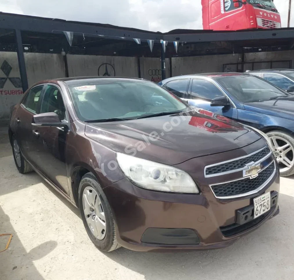 Chevrolet  Malibu  LS  2014  Automatic  215,000 km  4 Cylinder  FWD  Sedan  Light Brown  Gasoline