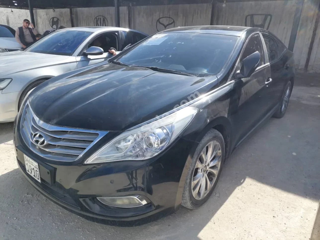 Hyundai  Grandeur  2012  Automatic  189,000 km  4 Cylinder  FWD  Sedan  Black  Gasoline