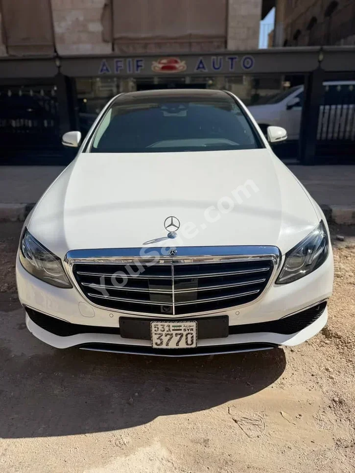 Mercedes-Benz  E-Class  400  2017  Automatic  150,000 km  6 Cylinder  4WD  Sedan  White  Gasoline