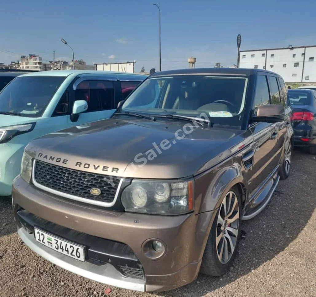 Land Rover  Range Rover  Sport  2012  Automatic  140,000 km  6 Cylinder  4WD  SUV  Brown  Gasoline
