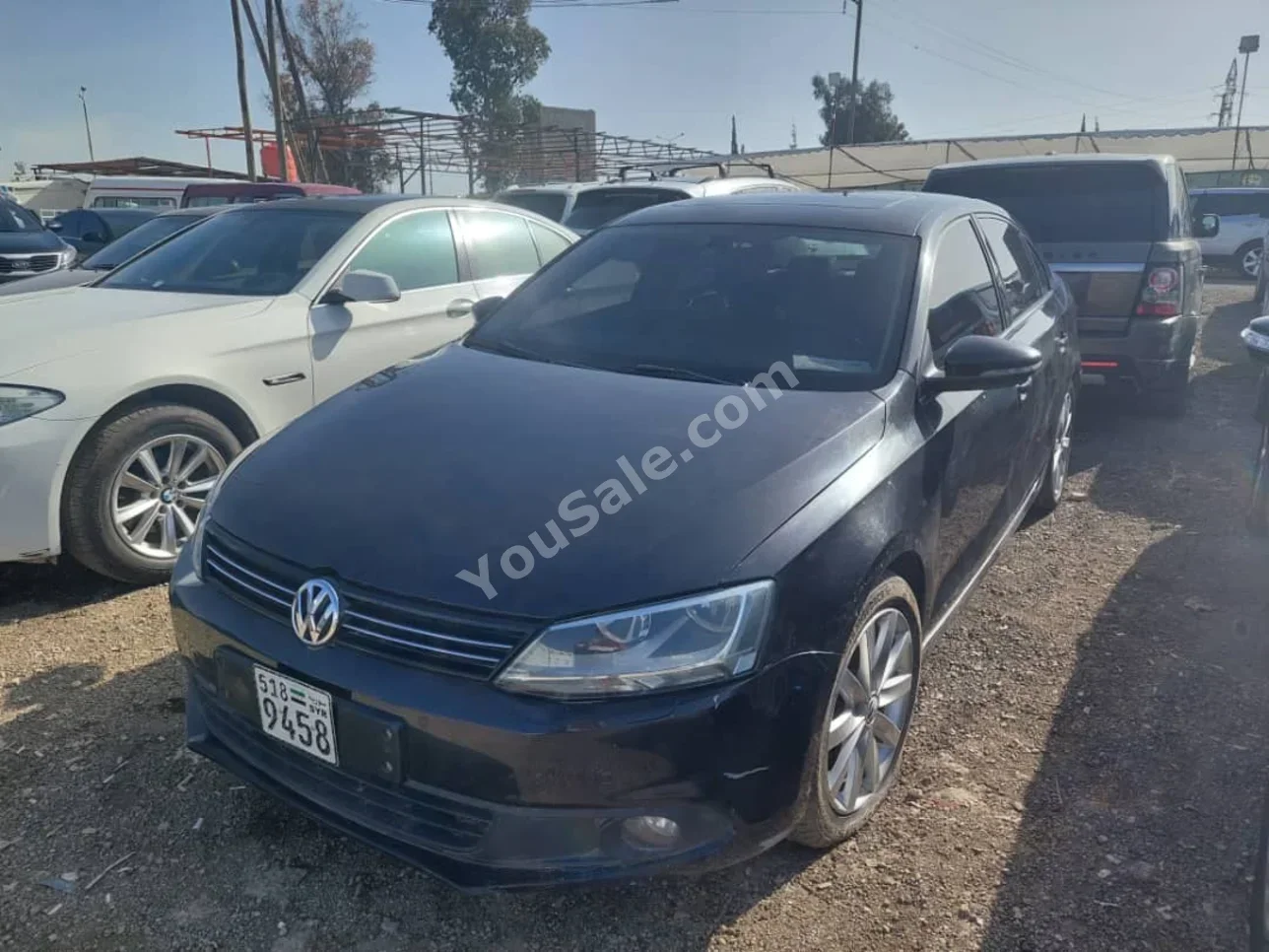 Volkswagen  Jetta  2012  Automatic  88,000 km  4 Cylinder  FWD  Sedan  Black  Diesel