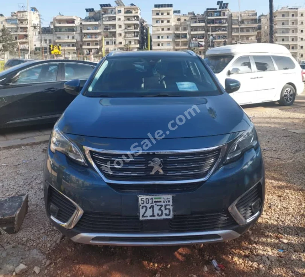 Peugeot  5008  2018  Automatic  180,000 km  4 Cylinder  FWD  SUV  Gray Metallic  Gasoline