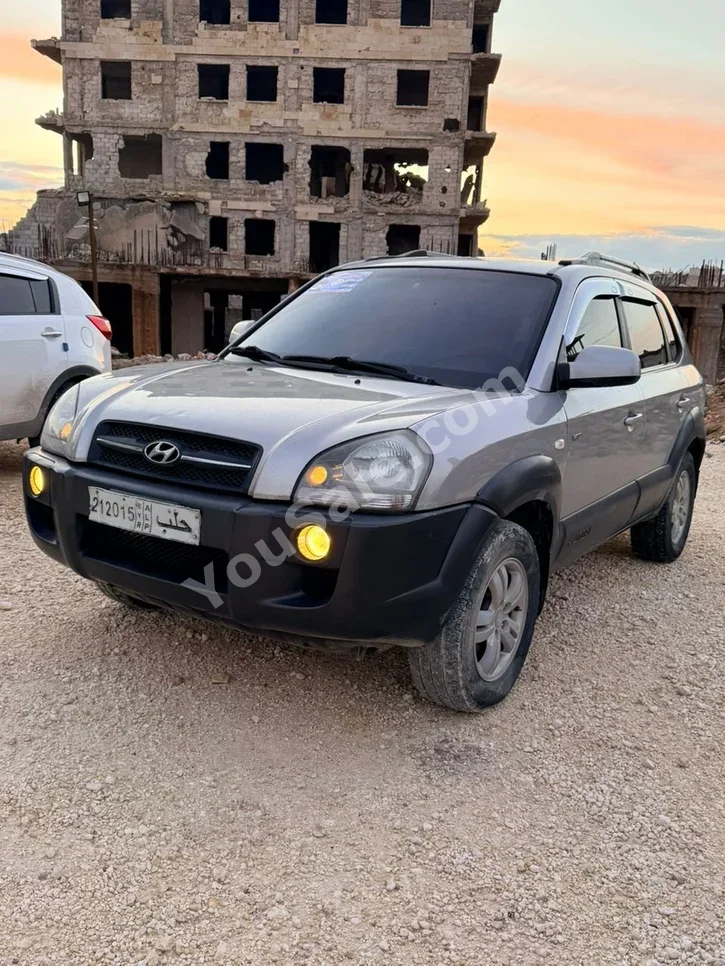 Hyundai  Tucson  2007  Automatic  344,000 km  4 Cylinder  FWD  SUV  Silver  Diesel
