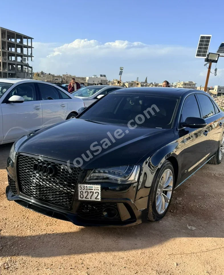 اودي  أي 8  أل  2018  اتوماتيك  320,000 كم  4 سلندر  دفع رباعي  سيدان  أسود  ديزل
