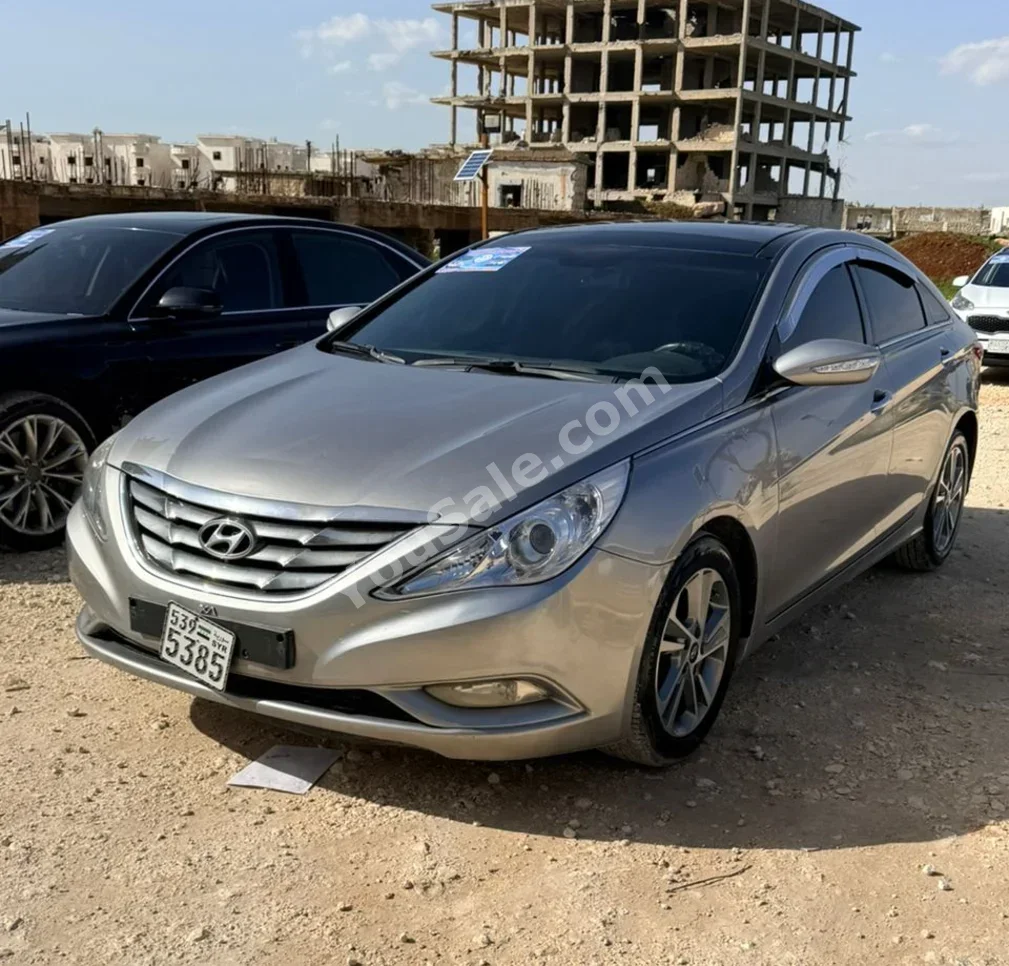 Hyundai  Sonata  2012  Automatic  189,000 km  4 Cylinder  FWD  Sedan  Silver  Gasoline